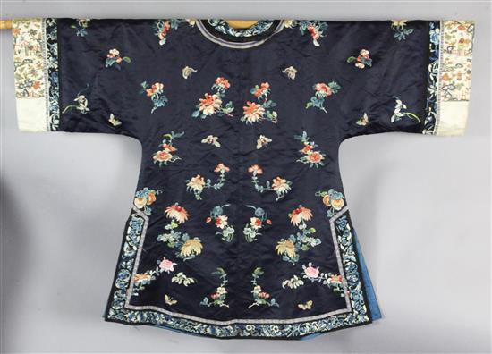 A Chinese embroidered midnight blue silk robe, 20th century, length 99cm